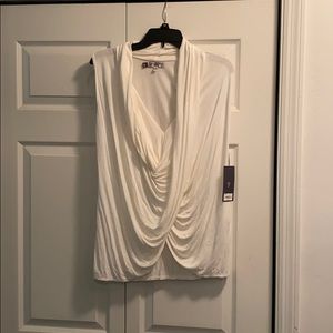 Jennifer Lopez medium bright white blouse.